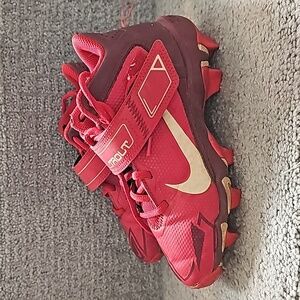 Nike Kids Red and Maroon Cleats with White Swoosh